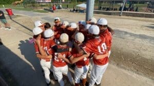 Baseball U Long Island players in a team huddle
